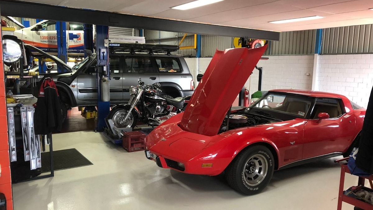 Red Corvette in Dandenong workshop